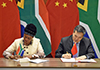 Deputy Minister Reginah Mhaule and Vice-Minister Qian Keming sign the agreed Minutes of the Second Session of the South Africa-China Joint Working Group, Pretoria, South Africa, 28 May 2018.