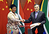 Deputy Minister Reginah Mhaule and Vice-Minister Qian Keming sign the agreed Minutes of the Second Session of the South Africa-China Joint Working Group, Pretoria, South Africa, 28 May 2018.