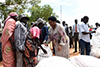Deputy Minister Candith Mashego-Dlamini with Dr Manasseh Lomole, Chairperson of South Sudan's Relief and Rehabilitation Commission, during a handover ceremony of food aid to the Holy Trinity Church, Juba, South Sudan, 8 August 2019.