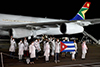 Minister Naledi Pandor welcomes the Cuban Medical Brigade, Waterkloof Air Force Base, Pretoria, South Africa, 26 April 2020.