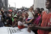 A happy Malagasy growd claps hands after the Handout Ceremony, 13 March 2012.