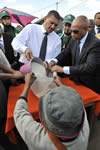 Deputy Minister Marius Fransman and Foreign Minister Pierrot Jocelyn Rajaonarivelo of Madagascar, hand out blankets and food donated by Al-Imdaad Foundation based in South Africa, 13 March 2012.