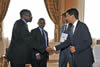 SADC Troika Meeting with the President of Madagascar, Andry Rajoelina; Zambian High Commissioner to South Africa, Mr M S Chikonde (shaking hands with President); Tanzanian Deputy Minister for Foreign Affairs and International Co-operation, Mr Mahadhi Juma Maalim; and Deputy Minister of International Relations and Cooperation of South Africa, Mr Marius Fransman, Madagascar, 14 March 2012.