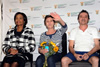 Minister Maite Nkoana-Mashabane and Bruno Pelizzari look on as Debbie Calitz waves emotionally at friends and family at the Press Briefing at the O. R. Tambo International Airport in Johannesburg.