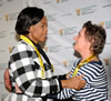 Minister Maite Nkoana-Mashabane and Debbie Calitz embrace at the Press Briefing upon her and Bruno Pelizzari's arrival at the O. R. Tambo International Airport, Johannesburg, South Africa, 27 June 2012.