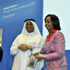 Outgoing President of COP17/CMP7 Ms Maite Nkoana-Mashabane and Minister of Internatioanl Relations and Cooperation of South Africa hands COP18/CMP8 President of Qatar, Mr Abdullah bin Hamad al-Attiyah, a copy of the book during her COP17/CMP7 Legacy project book launch, Doha, Qatar, 27 November 2012.