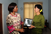 Minister Maite Nkoana-Mashabane presents Mrs Daw Aung San Suu Kyi with a book on Nelson Mandela at the conclusion of their Meeting, Nay Pyi Taw, Myanmar, 4 September 2012.
