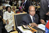 President Jacob Zuma during the opening of the AU Summit. Seated behind him is Minister Maite Nkoana-Mashabane and Minister Nkosazana Dlamini Zuma, 15 July 2012.