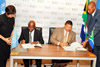 Deputy Minister Marius Fransman and UN Resident Representative, Dr. Agostinho Zacarias, sign the Strategic Cooperation Framework: 2013-17 agreements during the signing ceremony, Pretoria, South Africa, 26 February 2013.