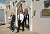 Deputy Minister Marius Fransman (right) walks with Professor Cyril Karabus outside the South African Embassy in Abu Dhabi, United Arab Emirates, 3 March 2013.