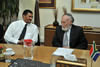 Deputy Minister Marius Fransman meets with Professor Cyril Karabus in Abu Dhabi, United Arab Emirates, 3 March 2013.