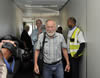 Prof. Karabus arrives at the Cape Town International Airport. He is met by his family while coming off the plane and the crowds of Cape Town Community members welcome him back home, Cape Town International Airport, 17 May 2013.