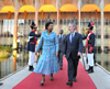 Minister Maite Nkoana-Mashabane is welcomed by her counterpart, Foreign Minister Antonio Patriota of Brazil; as she arrives at the Foreign Ministry in Brasília ahead of their Bilateral Meeting. South African Ambassador to Brazil, Mr Mbete, walks behind them, Brasilia, Brazil, 30 July 2013.
