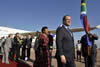 President François Hollande of France arrives at the Waterkloof Air Force Base, Pretoria, South Africa. He is received by the Minister of International Relations and Cooperation, Ms Maite Nkoana-Mashabane, 14 October 2013.