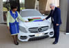 Minister Maite Nkoana-Mashabane and the Federal Minister of Foreign Affairs of Germany, Dr Frank-Walter Steinmeier, view a beaded Mercedes Benz model ahead of the Eighth Session of the South Africa-Germany Bi-National Commission (BNC) in Pretoria, South Africa, 21 November 2014.