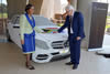 Minister Maite Nkoana-Mashabane and the Federal Minister of Foreign Affairs of Germany, Dr Frank-Walter Steinmeier, view a beaded Mercedes Benz model ahead of the Eighth Session of the South Africa-Germany Bi-National Commission (BNC) in Pretoria, South Africa, 21 November 2014.