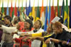 Woman sing during the POWA opening event at the O R Tambo Building, Pretoria, South Africa, 30-31 August 2013.