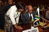 President Jacob Zuma consults with Minister Maite Nkoana-Mashabane during the NEPAD Meeting on the sidelines of the 23rd African Union Assembly (AU Summit), Malabo, Equatorial Guinea, 25-27 June 2014.