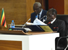 President Robert Mugabe, Chair of SADC, peruse his notes before the opening session of the SADC Double Troika plus Two, Pretoria, South Africa, 15 September 2014.