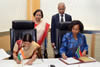 Minister Maite Nkoana-Mashabane with her Indian Counterpart Minister of External Affairs and Overseas Indian Affairs, Ms Sushma Swaraj, sign the minutes of the 9th South Africa-India Joint Ministerial Commission, Durban, South Africa, 19 May 2015.