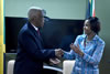 Minister Maite Nkoana-Mashabane and the Minister of Foreign Affairs and Foreign Trade, Senator Arnold J. Nicholson, QC, of Jamaica, shake hands after exchanging signed Memorandum of Understanding on the Establishment of Political Consultations at the conclusion of the Bilateral Meeting, Kingston, Jamaica, 20-22 September 2015.