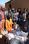 Minister Maite Nkoana-Mashabane meets an elderly lady who was a recipient of a bed, two bunk-beds and bedding from the Chinese Embassy and also some food stuff donated by DIRCO staff during the 67 minutes of Mandela Day, Winterveldt, Pretoria, South Africa, 17 July 2015.