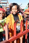 Minister Maite Nkoana-Mashabane paints a fence and plants some seedlings at during the 67 minutes of Mandela Day, Winterveldt, Pretoria, South Africa, 17 July 2015.