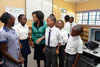 Minister Maite Nkoana-Mashabane at the Maxeke Secondary School. Left of the Minister is Sekelekwane Naledi (14) and on the right is Modupi Kananelo (14)