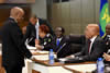 The Prime Minister of Lesotho, Tom Thabane, greets President Robert Mugabe and President Jacob Zuma during the SADC Extraordinary Double Troika Summit, Pretoria, South Africa, 20 February 2015.