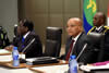 President Jacob Zuma during the SADC Extraordinary Double Troika Summit. In the background is President Robert Mugabe is chairing the meeting, Pretoria, South Africa, 20 February 2015.