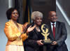President Jacob Zuma and Minister Maite Nkoana-Mashabane present the OR Tambo Lifetime Achievement award to Ruth Mompati at the Ubuntu Awards Ceremony, Cape Town, South Africa, 14 February 2015.