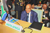 President Jacob Zuma shares a light moment with the media as he takes up his seat at the NEPAD HSGOC Meeting, Addis Ababa, Ethiopia, 29 January 2015.