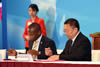 The Acting Group CEO of Prasa, Mr Collins Letsoalo, and the Vice President of CCC, Mr Zhen Shaohua, sign the MOU (Memorandum of Understanding) between Prasa and the China Communications Construction (CCC) on the Moloto Rail Corridor, The Second Investing in Africa Forum, Gungzhou, People's Republic of China, 7 September 2016.