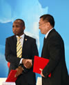 The Acting Group CEO of Prasa, Mr Collins Letsoalo, and the Vice President of CCC, Mr Zhen Shaohua, sign the MOU (Memorandum of Understanding) between Prasa and the China Communications Construction (CCC) on the Moloto Rail Corridor, The Second Investing in Africa Forum, Gungzhou, People's Republic of China, 7 September 2016.