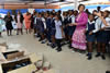 Minister Maite Nkoana-Mashabane hands over school shoes to scholars during her visit to Primary Schools, Limpopo, South Africa, 5 February 2016.